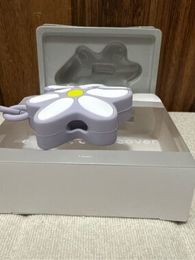 heyday Lilac Daisy Cable Protector with White Petals and Yellow Center